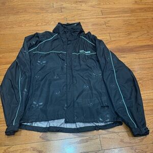 Harley Jacket with tuck away hood. 
Has skull faces 
Brand: Harley Davidson